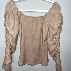 Long, puffy sleeve shirt. Very soft